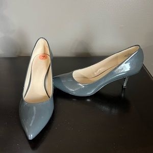 Gray patent leather pumps